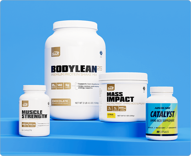 AdvoCare Muscle Strength, BodyLean25, Mass Impact, and Catalyst sitting on a blue platform.
