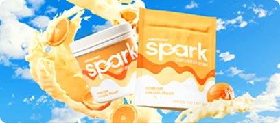 Spark Orange Cream Float Canister and Gusset Bag against a blue sky background.