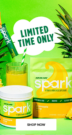 Spark Pineapple Whip Canister and Gusset bag next to a glass of mixed Spark Pineapple Whip and sliced pineapples.