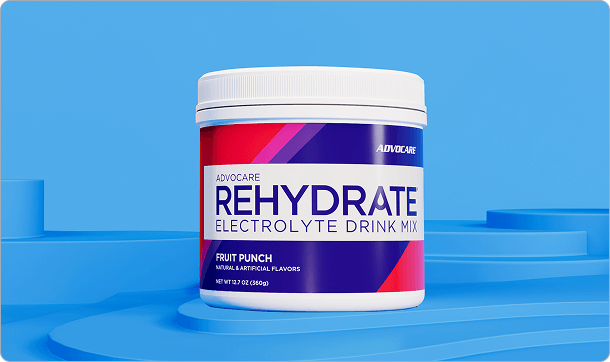 AdvoCare Rehydrate Fruit Punch Canister sitting on a blue platform.
