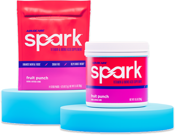 Spark Fruit Punch Stick Pack bag and Canister on blue platforms.