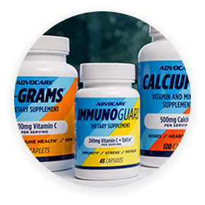AdvoCare C-Grams, ImmenoGuard and Calcium-D3 bottles sitting on a desk.