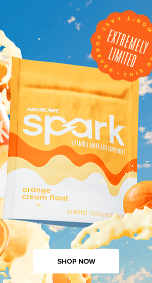 Orange Cream Float is Back. Extremely Limited! Shop the Flavor. Spark Orange Cream Float gusset bag against a blue sky with clouds.