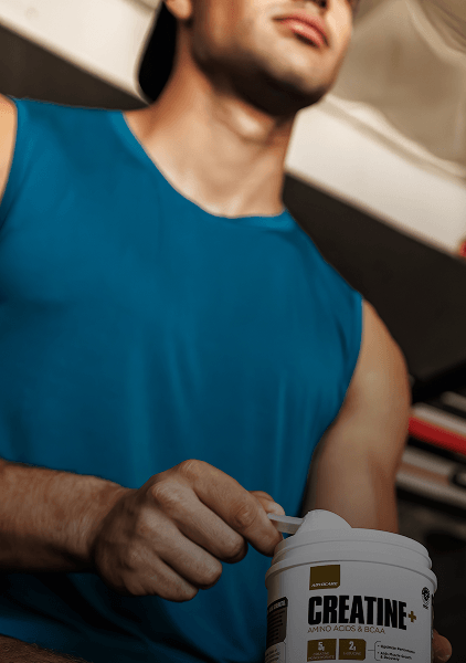 Sports Performance - Man scooping AdvoCare Creatine+
